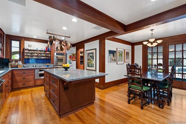 Chandelier, Dining room, Interior, Kitchen, Recessed Lighting, Stainless Steel Appliances, Wooden Beams, Wood Texture Flooring