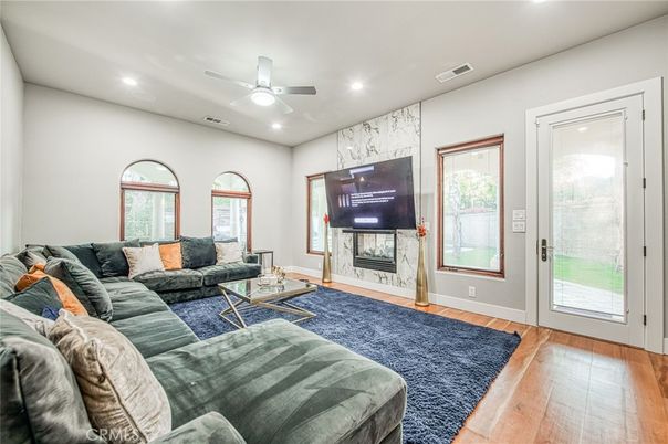 Fireplace, Interior, Living room, Recessed Lighting, Wood Texture Flooring