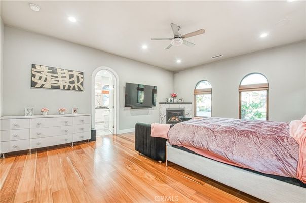 Bedroom, Fireplace, Interior, Recessed Lighting, Wood Texture Flooring