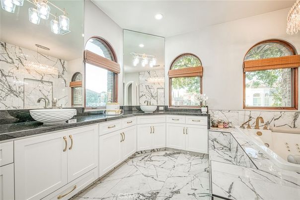 Bathroom, Dual Sink Vanities, Interior, Marble, Marble Walls, Recessed Lighting