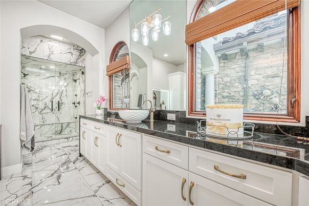 Bathroom, Dual Sink Vanities, Glass Shower, Interior, Marble, Marble Walls, Recessed Lighting