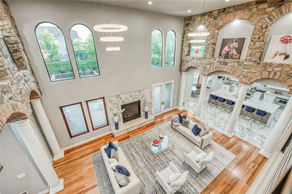 Dining room, Fireplace, Interior, Living room, Pendant Lights, Recessed Lighting, Stone Walls, Wood Texture Flooring