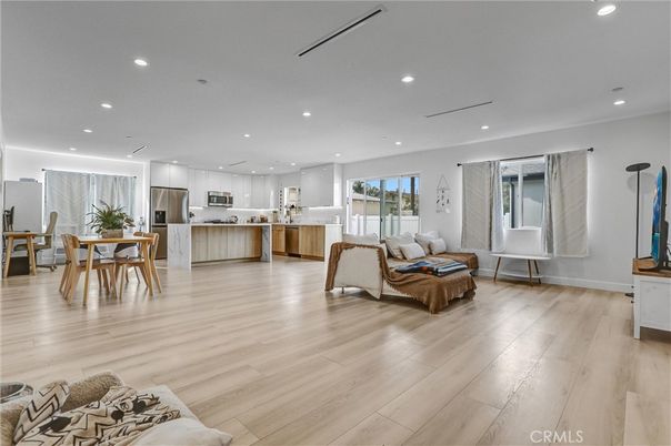 Dining room, Interior, Kitchen, Living room, Recessed Lighting, Stainless Steel Appliances, Wood Texture Flooring