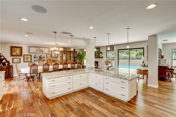 Chandelier, Dining room, Fireplace, Interior, Kitchen, Pendant Lights, Recessed Lighting, Wood Texture Flooring