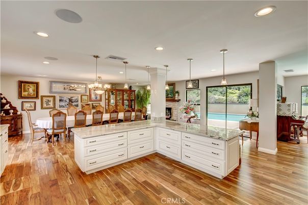 Chandelier, Dining room, Fireplace, Interior, Kitchen, Pendant Lights, Recessed Lighting, Wood Texture Flooring
