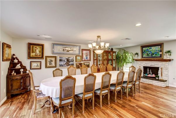 Chandelier, Dining room, Fireplace, Interior, Recessed Lighting, Wood Texture Flooring