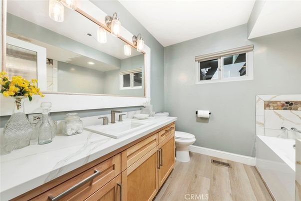 Bathroom, Dual Sink Vanities, Interior, Recessed Lighting, Wood Texture Flooring