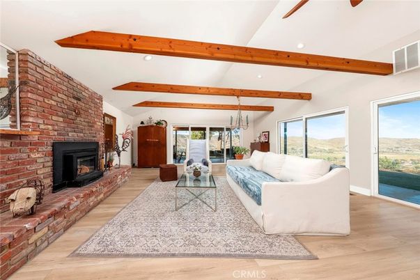 Fireplace, Interior, Living room, Recessed Lighting, Stone Walls, Wooden Beams, Wood Texture Flooring