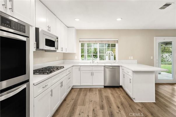 Interior, Kitchen, Recessed Lighting, Stainless Steel Appliances, Wood Texture Flooring