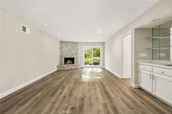 Empty room, Fireplace, Interior, Recessed Lighting, Wood Texture Flooring