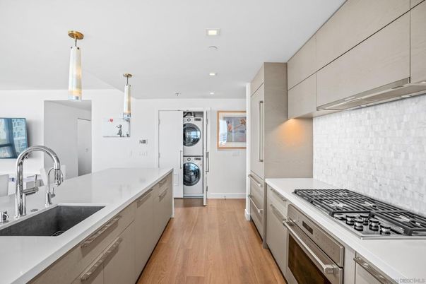 Interior, Kitchen, Recessed Lighting, Stainless Steel Appliances, Washer, Wood Texture Flooring