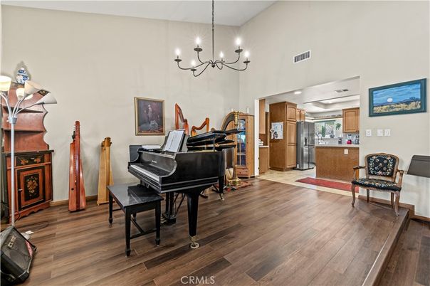 Chandelier, Interior, Kitchen, Piano, Recessed Lighting, Wood Texture Flooring