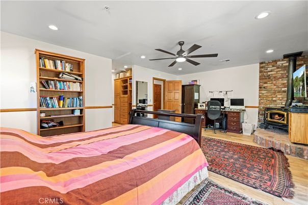 Bedroom, Fireplace, Home Office, Interior, Recessed Lighting, Stone Walls, Wood Texture Flooring