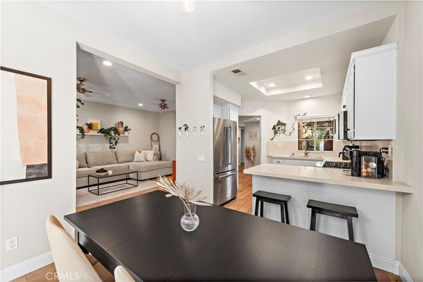 Dining room, Interior, Kitchen, Living room, Recessed Lighting, Stainless Steel Appliances, Wood Texture Flooring