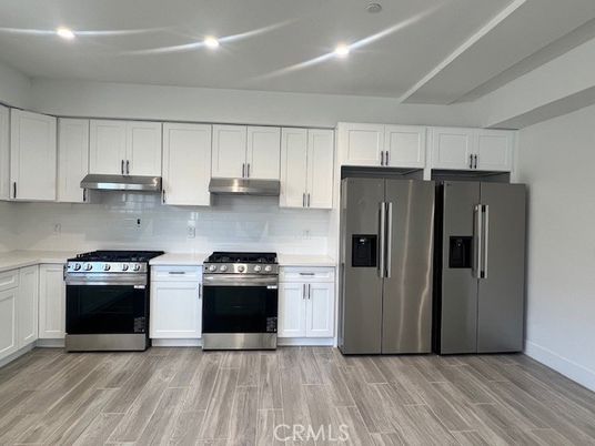 Interior, Kitchen, Recessed Lighting, Stainless Steel Appliances, Wood Texture Flooring