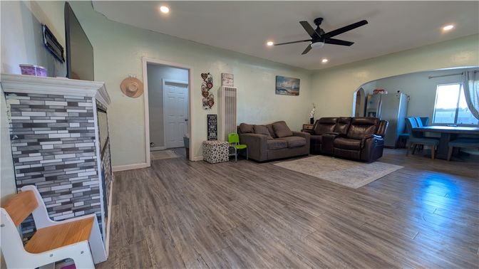 Fireplace, Interior, Living room, Recessed Lighting, Wood Texture Flooring
