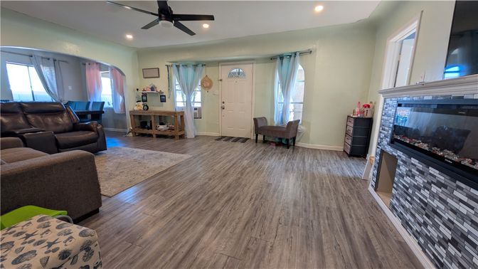 Fireplace, Interior, Living room, Recessed Lighting, Wood Texture Flooring