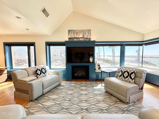 Fireplace, Interior, Living room, Recessed Lighting, Water, Wood Texture Flooring