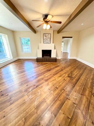 Empty room, Fireplace, Interior, Recessed Lighting, Wooden Beams, Wood Texture Flooring