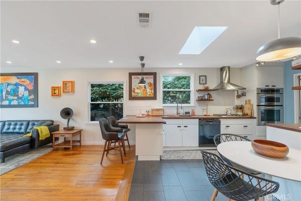 Dining room, Interior, Kitchen, Pendant Lights, Recessed Lighting, Stainless Steel Appliances, Wood Texture Flooring