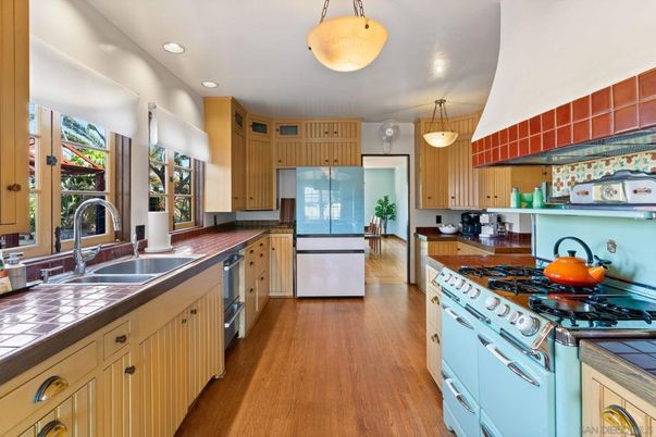 Interior, Kitchen, Pendant Lights, Recessed Lighting, Tile Countertops, Wood Texture Flooring
