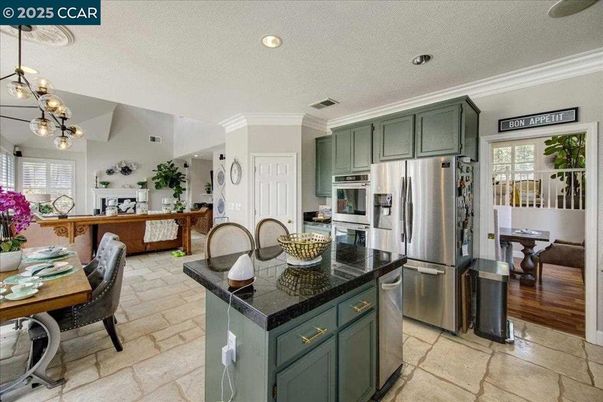 Dining room, Interior, Kitchen, Living room, Pendant Lights, Recessed Lighting, Stainless Steel Appliances, Wood Texture Flooring