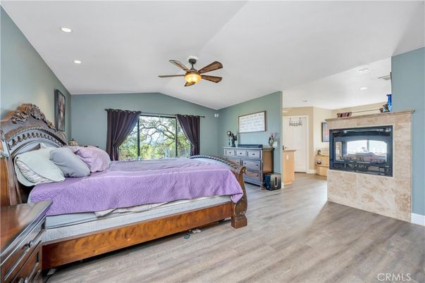 Bedroom, Fireplace, Interior, Recessed Lighting, Wood Texture Flooring