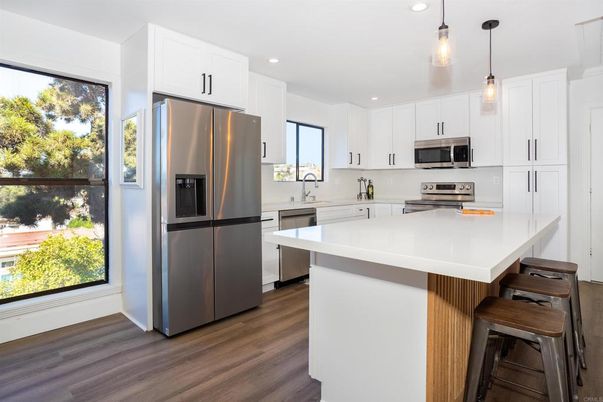 Interior, Kitchen, Pendant Lights, Recessed Lighting, Stainless Steel Appliances, Wood Texture Flooring