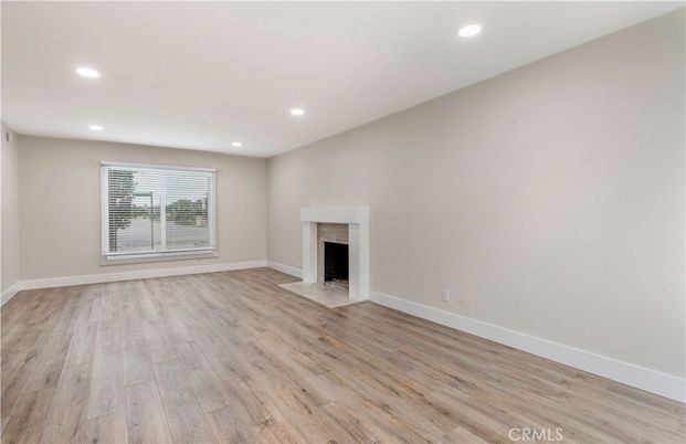 Empty room, Fireplace, Interior, Recessed Lighting, Wood Texture Flooring