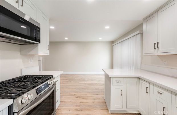 Interior, Kitchen, Recessed Lighting, Stainless Steel Appliances, Wood Texture Flooring