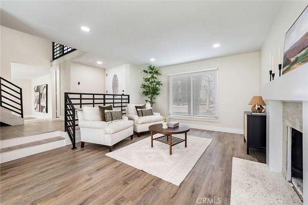 Fireplace, Interior, Living room, Recessed Lighting, Wood Texture Flooring