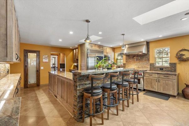 Interior, Kitchen, Pendant Lights, Recessed Lighting, Stainless Steel Appliances, Stone Walls