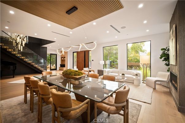 Dining room, Fireplace, Interior, Living room, Pendant Lights, Recessed Lighting, Wood Texture Flooring