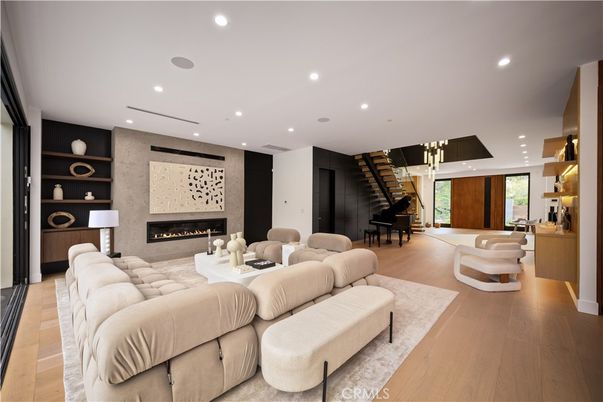Fireplace, Interior, Living room, Piano, Recessed Lighting, Wood Texture Flooring