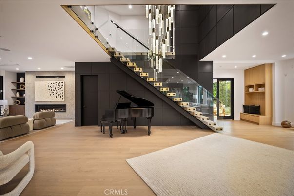 Fireplace, Interior, Pendant Lights, Piano, Recessed Lighting, Wood Texture Flooring