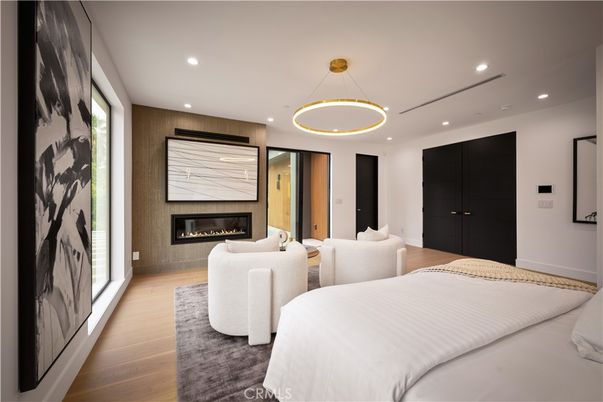 Bedroom, Fireplace, Interior, Pendant Lights, Recessed Lighting, Wood Texture Flooring