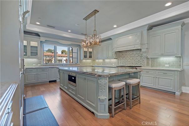 Chandelier, Interior, Kitchen, Pendant Lights, Recessed Lighting, Stainless Steel Appliances, Wood Texture Flooring