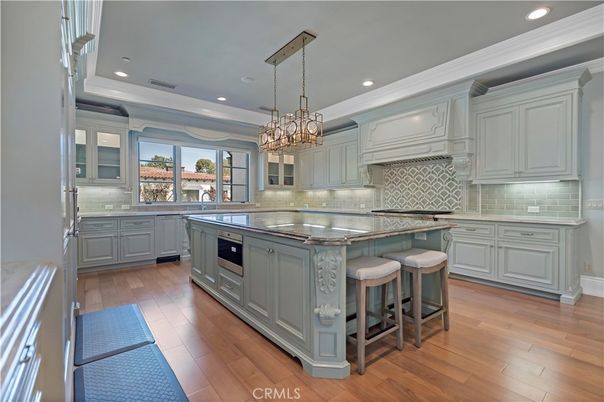 Chandelier, Interior, Kitchen, Pendant Lights, Recessed Lighting, Stainless Steel Appliances, Wood Texture Flooring