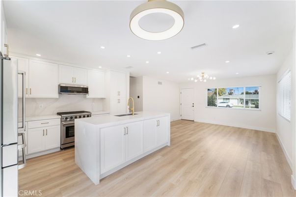 Interior, Kitchen, Pendant Lights, Recessed Lighting, Stainless Steel Appliances, Wood Texture Flooring