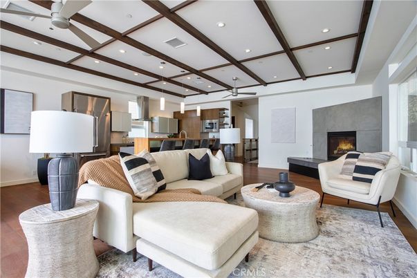 Fireplace, Interior, Kitchen, Living room, Pendant Lights, Recessed Lighting, Stainless Steel Appliances, Wood Texture Flooring