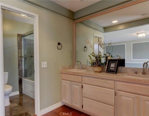 Bathroom, Dual Sink Vanities, Glass Shower, Interior, Recessed Lighting, Wood Texture Flooring