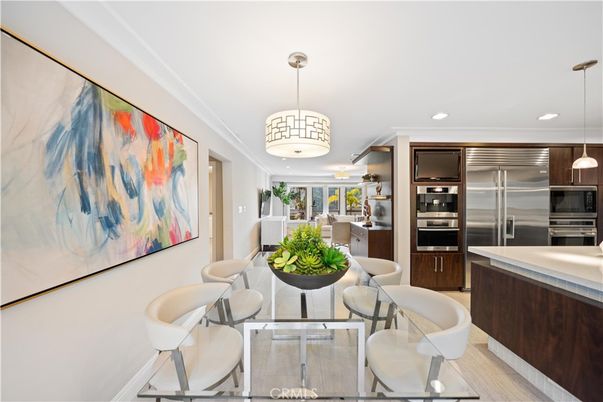 Dining room, Interior, Kitchen, Pendant Lights, Recessed Lighting, Stainless Steel Appliances, Wood Texture Flooring