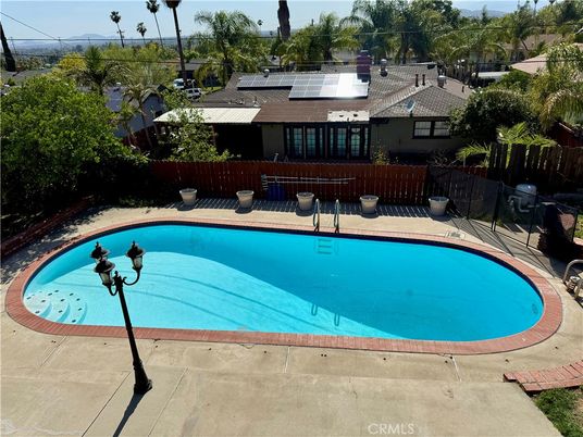 Exterior, Pool, Solar Panels
