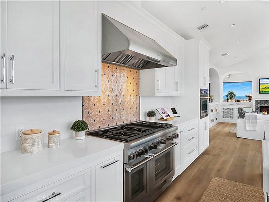 Fireplace, Interior, Kitchen, Recessed Lighting, Stainless Steel Appliances, Wood Texture Flooring