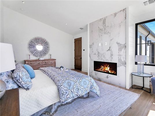 Bedroom, Fireplace, Interior, Marble Walls, Recessed Lighting, Wood Texture Flooring