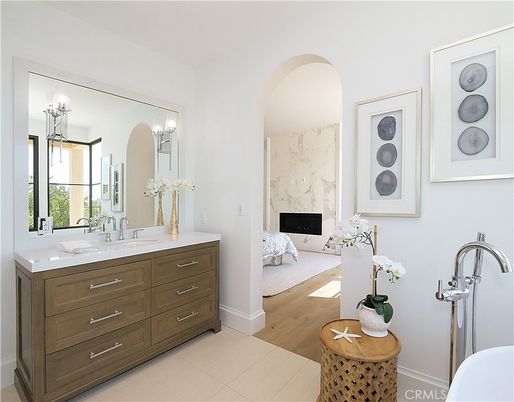 Bathroom, Dual Sink Vanities, Fireplace, Interior, Wood Texture Flooring