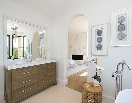 Bathroom, Dual Sink Vanities, Fireplace, Interior, Wood Texture Flooring