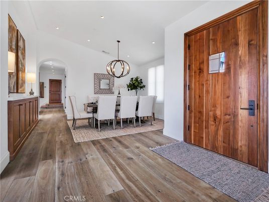 Chandelier, Dining room, Interior, Pendant Lights, Recessed Lighting, Wood Texture Flooring, Wooden Walls