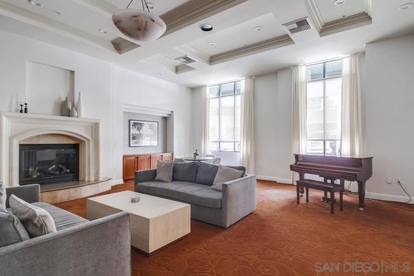 Fireplace, Interior, Living room, Piano, Recessed Lighting, Wood Texture Flooring