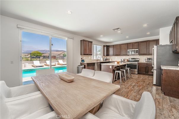 Dining room, Interior, Kitchen, Recessed Lighting, Stainless Steel Appliances, Wood Texture Flooring